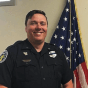 Covington Police officer Doug Ullrich, the department’s LGBTQ+ liaison, during a city council meeting.