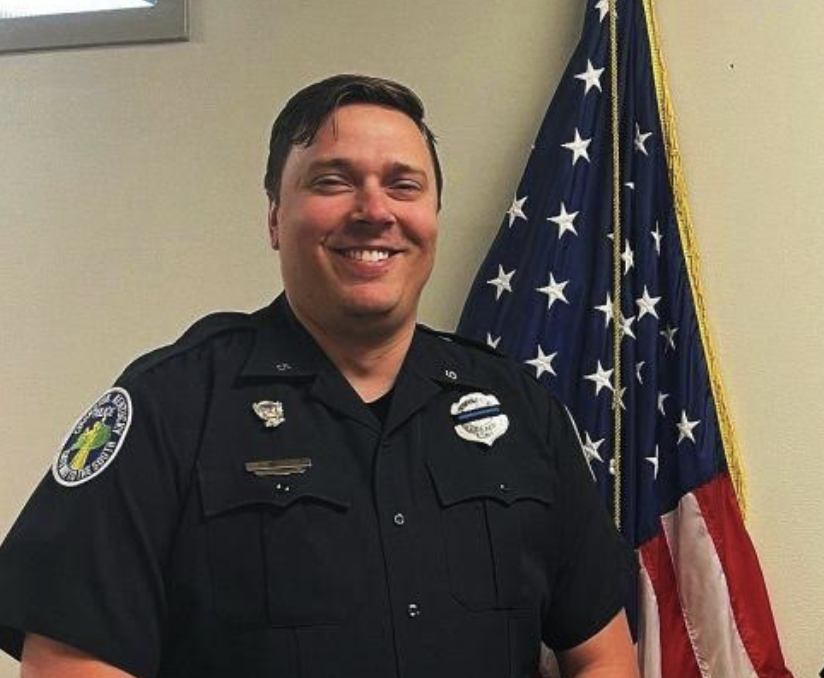 Covington Police officer Doug Ullrich, the department’s LGBTQ+ liaison, during a city council meeting.