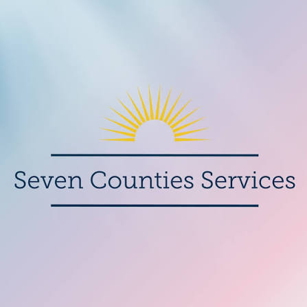 Seven Counties Services logo on a soft blue and pink gradient background, featuring a gold sunburst icon and navy blue serif text.