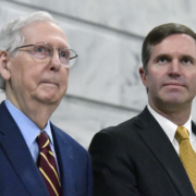 Senate Minority Leader Mitch McConnell, R-Ky., left, speaks with Kentucky Gov. Andy Beshear during a ceremony in the Rotunda at the Kentucky State Capitol in Frankfort, Ky., Jan. 2, 2024.