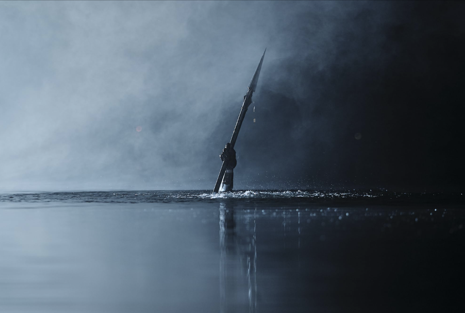 The killer Little Death emerges from a dark lake at night in Teenage Sex and Death at Camp Miasma (2026)
